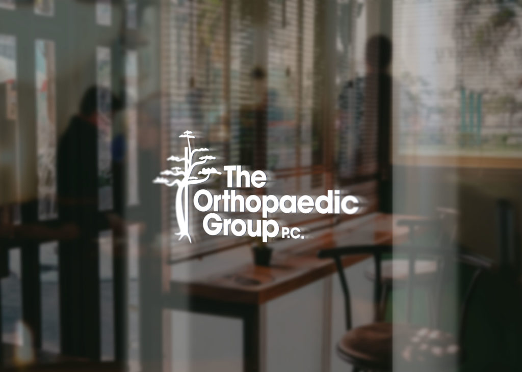 The Orthopaedic Group glass door logo mockup