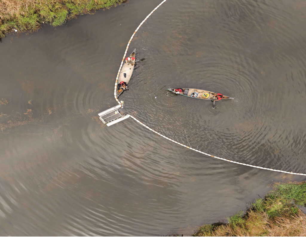 The Osprey Initiative team collecting litter from canoes